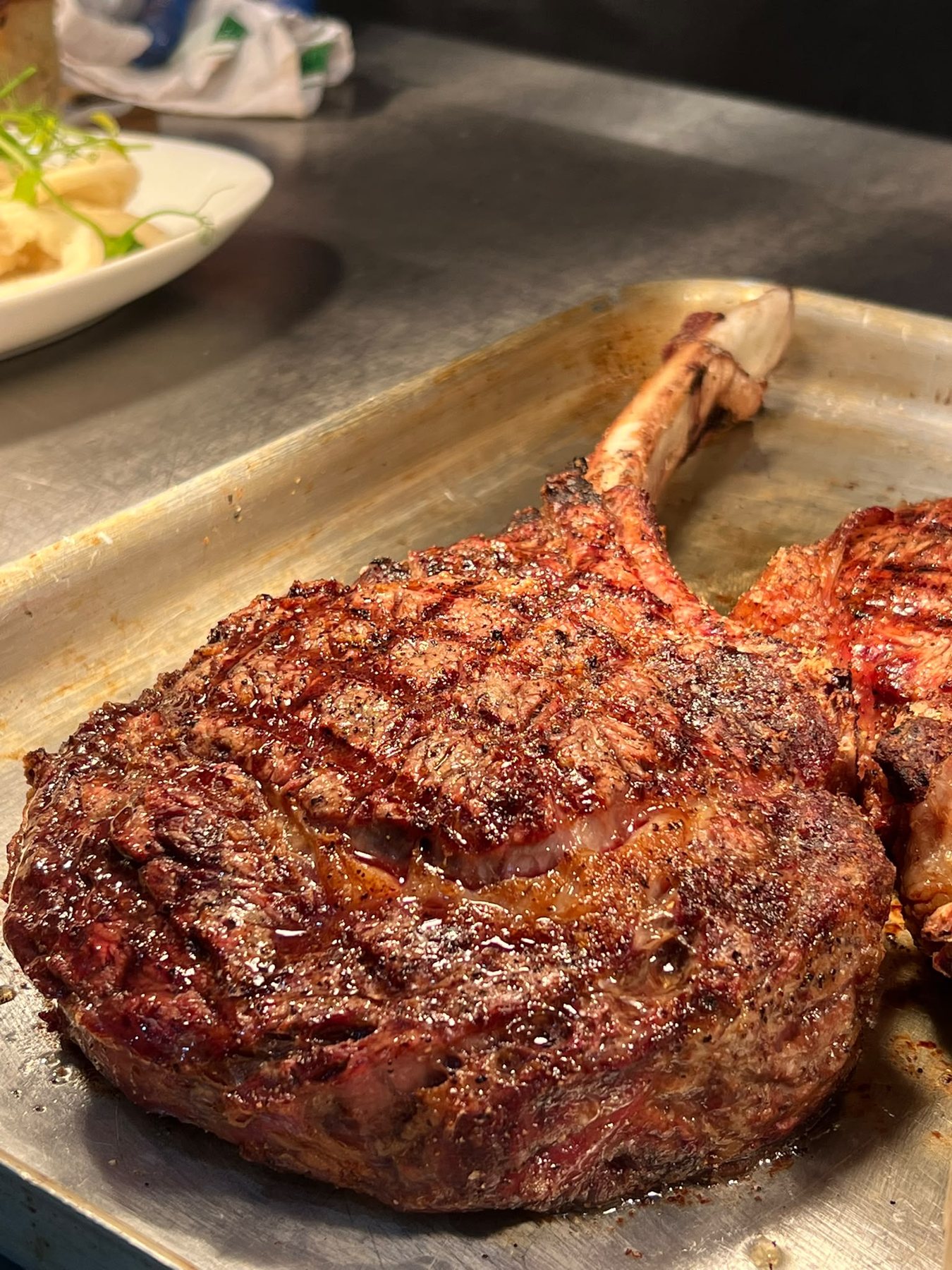 Tomahawk steak fresh off the grill