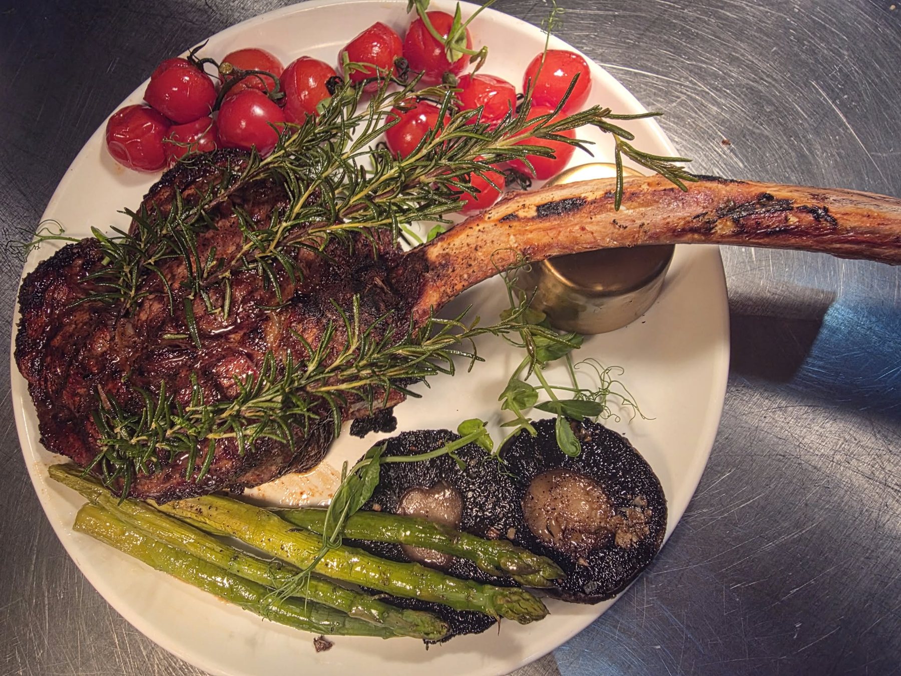 Tomahawk steak with grilled vegetables