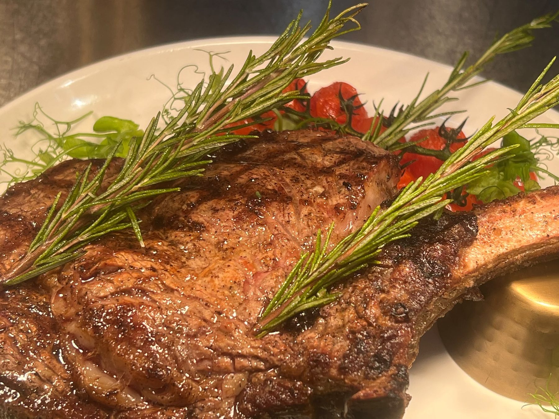 Tomahawk steak, char-grilled